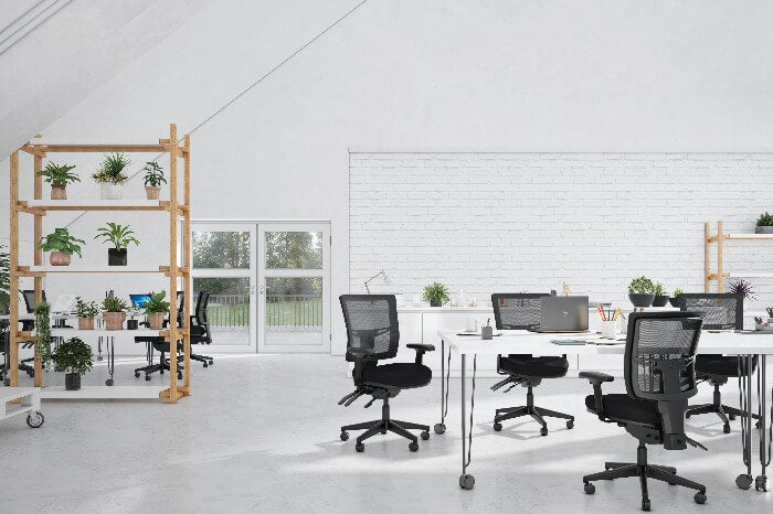 office setting with meeting table and buro metro two chairs