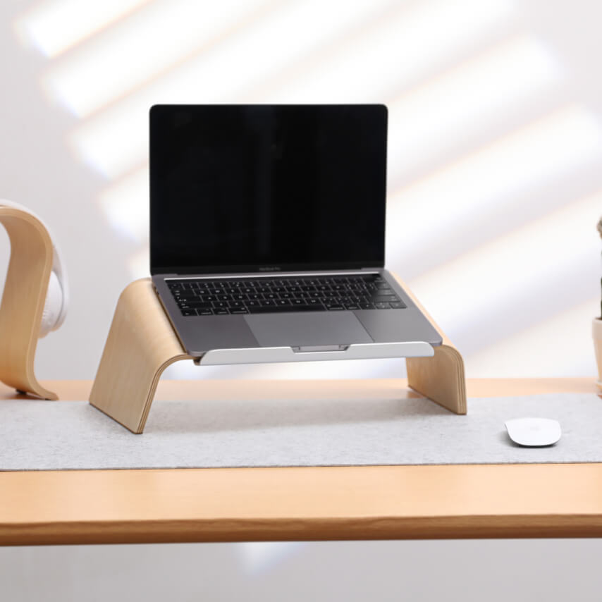 front view of laptop on birch desk