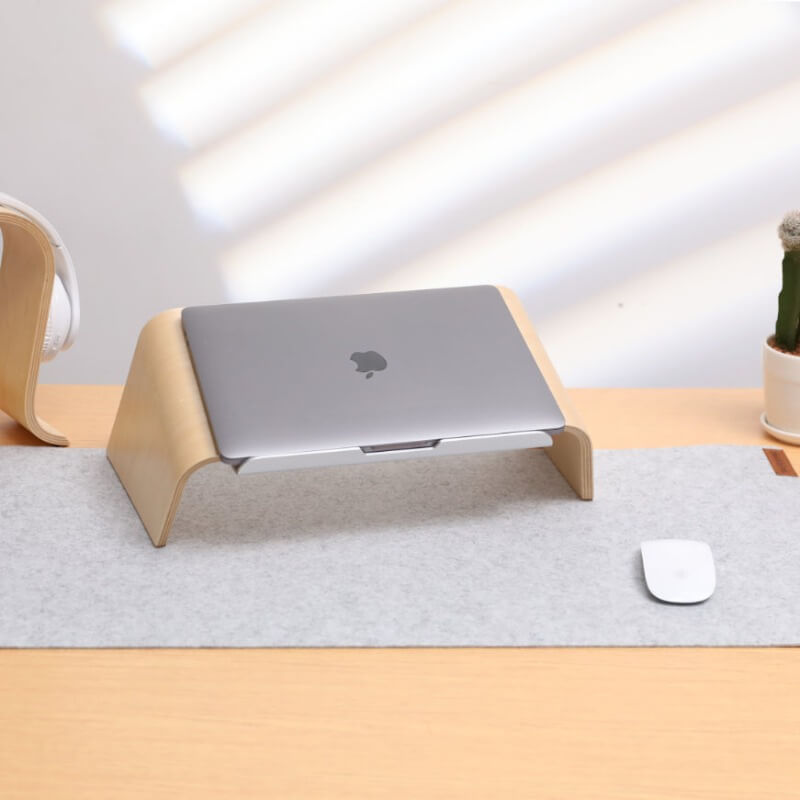 grey deskpad on standing desk