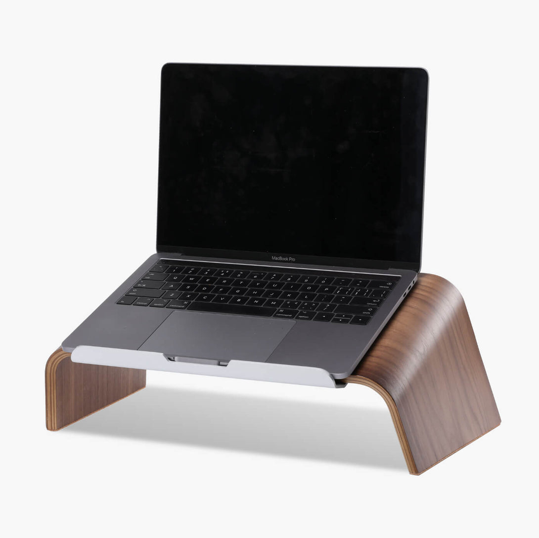 laptop stand with laptop on it