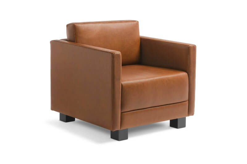 tan leather single chair with black legs