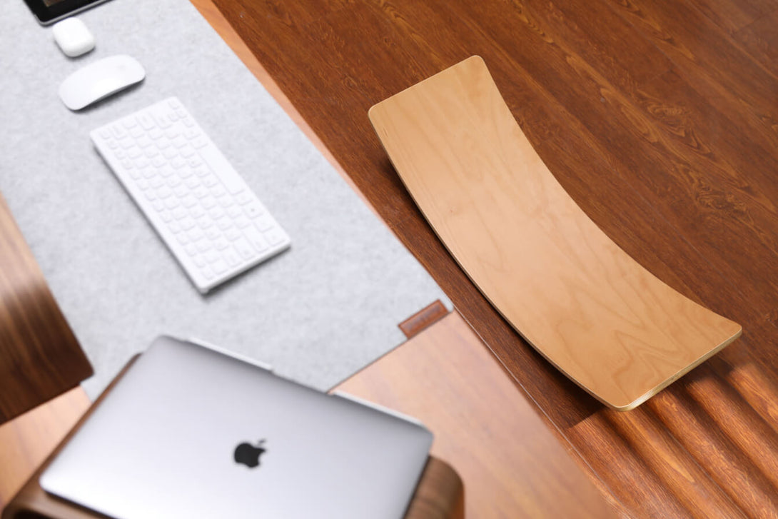 balance board under an adjustable desk